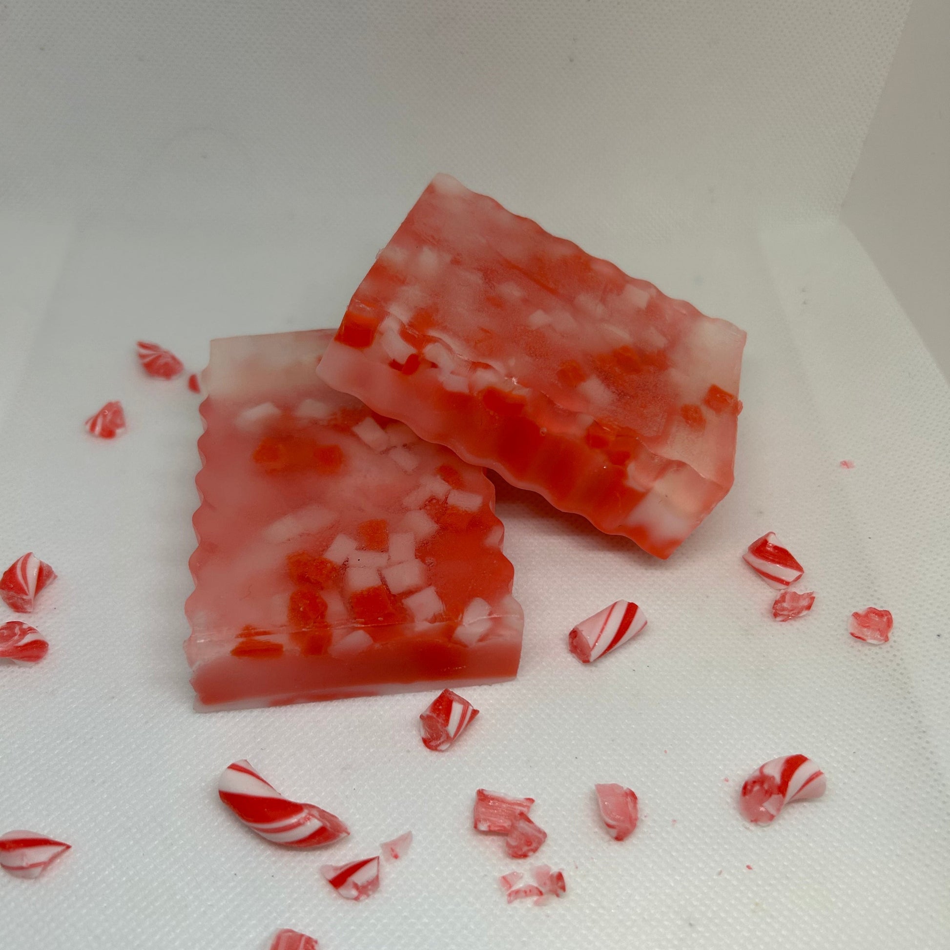 Handcrafted Frosted Cane soap bars with peppermint scent, perfect as a holiday gift and for skincare.